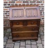 Oak bureau with linen fold panels