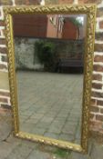 Gilt framed bevelled mirror 72 cm x 118 cm