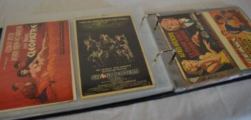 Postcard album of vintage movie posters and transport