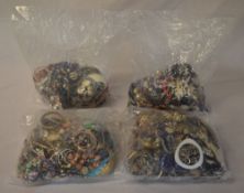 4 large mixed bags of costume jewellery