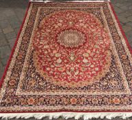 Red ground Keshan carpet 2.30m by 1.