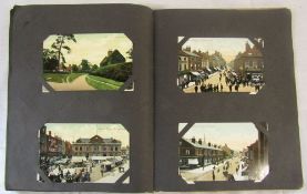 Postcard album containing approximately 100 real photographic,