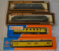 4 boxed model railway trains including Mainline & Roco