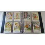 Brown postcard album containing assorted children design postcards by Mabel Lucie Attwell,