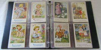 Brown postcard album containing assorted children design postcards by Mabel Lucie Attwell,