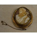 Yellow metal cameo brooch with safety chain,