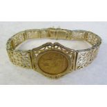 9ct gold ornate pierced bracelet set with a mounted 22ct gold Edward VII 1906 full sovereign with