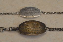 2 identity bracelets, both marked 'silver' engraved 'Dorothy E E Wilson, 158 Uppingham Road,