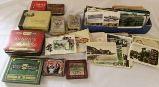 Box of assorted postcards,