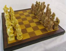 Chess board with Greek style chess pieces