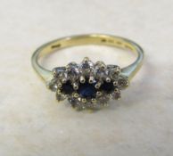 14ct gold cubic zirconia and sapphire ring 2.