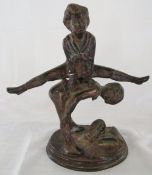 Bronze figure of two children playing leapfrog H 24 cm