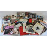 Approximately 82 7" 45 rpm singles mainly from the 1980s