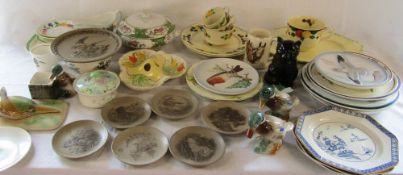 Selection of Poole pottery and Goebel bird plates, animal figurines, tureen,