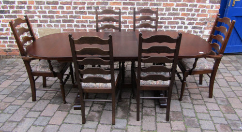 Oak draw leaf dining table and six ladder back chairs inc 2 carvers (extending to 214 cm W 90 cm)