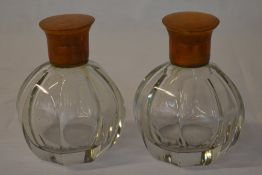 Pair of glass scent bottles (one with broken top)