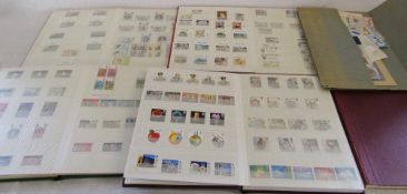 Selection of stamp albums inc Jersey & Guernsey and a folder,