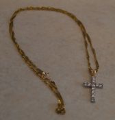 9ct gold chain with a yellow metal cross pendant with white stones, total approx weight 2.