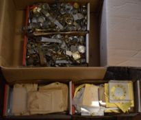 2 boxes of empty wristwatch cases and straps (no movements) box of small clock dials and a box of