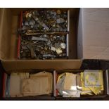 2 boxes of empty wristwatch cases and straps (no movements) box of small clock dials and a box of