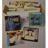 Box of assorted singles including Lionel Richie, Cyndi Lauper,