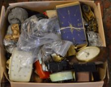 Large box of clock parts for spares or repair, including clock bodies, movements,