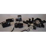 Olympus cameras, including XA3 with A11 flash attached, Trip 35, x2 OM10s with winders,