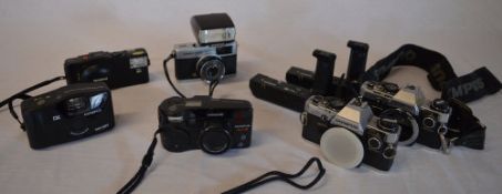 Olympus cameras, including XA3 with A11 flash attached, Trip 35, x2 OM10s with winders,