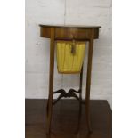 Edwardian oval sewing table with cloth basket