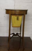 Edwardian oval sewing table with cloth basket