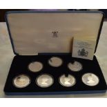 Seven silver proof coins in commemoration of Her Majesty Queen Elizabeth the Queen Mother's 80th