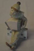 Lladro Boy Clown with Concertina on Domino