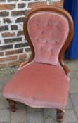 Victorian button back nursing chair on turned legs