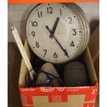 Various tools including a large adjustable spanner, large wall clock,