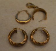 Pair of 9ct gold hoop earrings, 9ct gold clasp and two yellow metal single earrings,