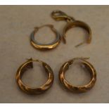 Pair of 9ct gold hoop earrings, 9ct gold clasp and two yellow metal single earrings,