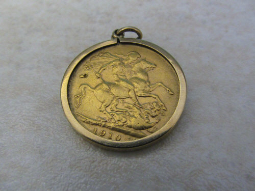 Edward VII full gold sovereign 1910 with 9ct gold mount