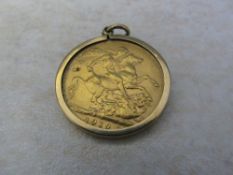 Edward VII full gold sovereign 1910 with 9ct gold mount
