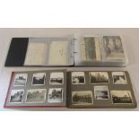 Album containing approximately 144 military postcards,