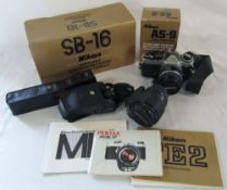 Selection of Nikon camera equipment - Nikon Fe2 35mm camera, MD-12 motorised winder,