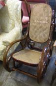 Cane seated rocking chair