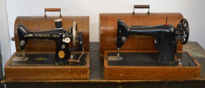 2 sewing machines with cases,