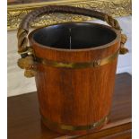 Brass bound wooden pail with rope and leather handle