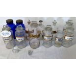 Various glass chemists bottles & jars in a wicker basket