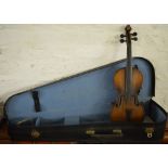 Cased violin with ebonised bridge with internal label,