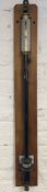 Metal ship stick barometer engraved J Griffin & Son 22 Garrick St, London on a board.