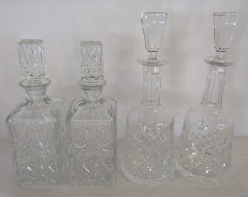 2 pairs of cut glass decanters