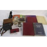 Assorted books relating to Royalty, Brownie box camera, pair of old glasses,