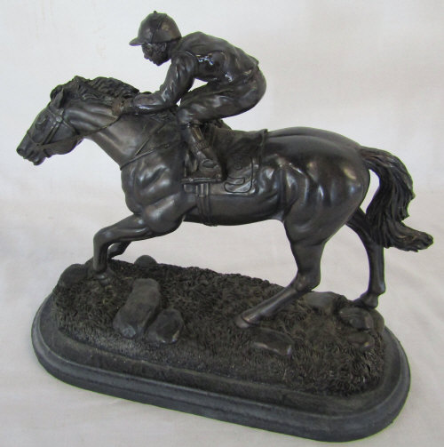 Bronze effect horse and jockey (repaired) L 27 cm