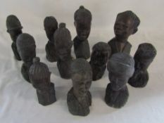 Box of carved wooden tribal / African busts hand crafted in Zimbabwe